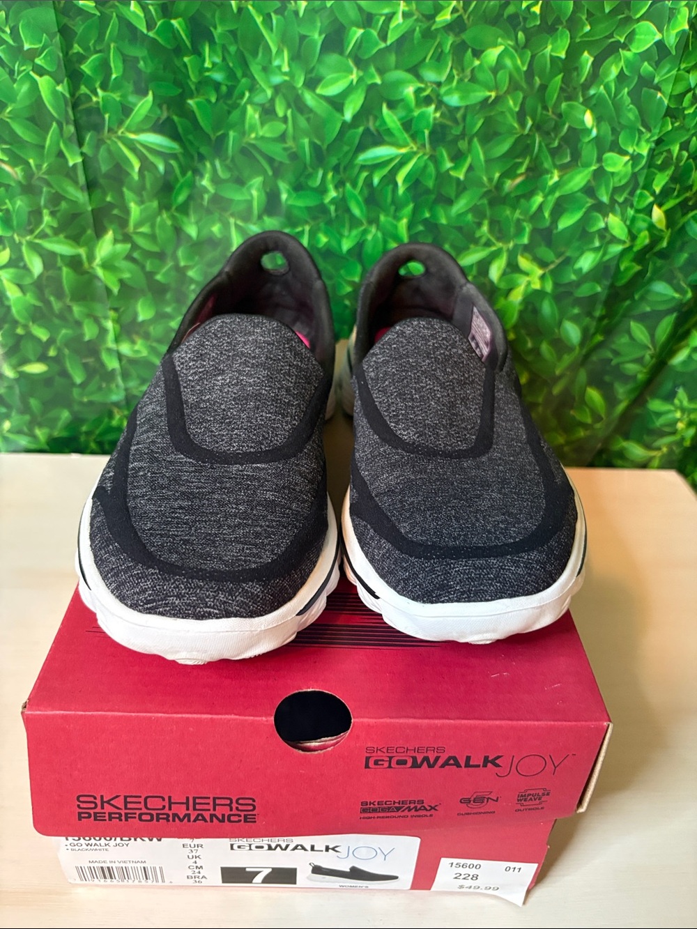 Skechers Kids Slip-On Sneakers in Black and White